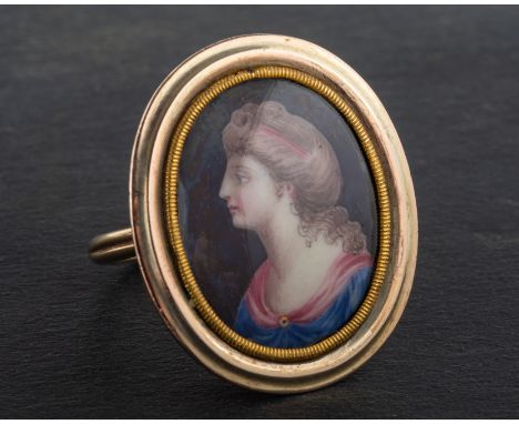 A 9ct gold, handpainted, oval, porcelain portrait ring, depicting portrait of a lady in profile, the band with hallmarks for 