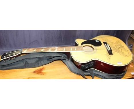 A Lindo guitar with carry bagCondition report: Some very light marks only.Overall very good condition.