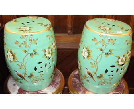 A pair of Chinese style floral painted ceramic barrel seats, each height 45cmCondition report: Very good condition, no appare