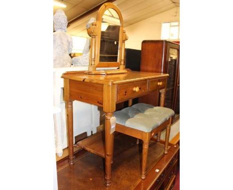 A modern pine round cornered dressing table, together with upholstered top dressing stool and further arch top dressing mirro