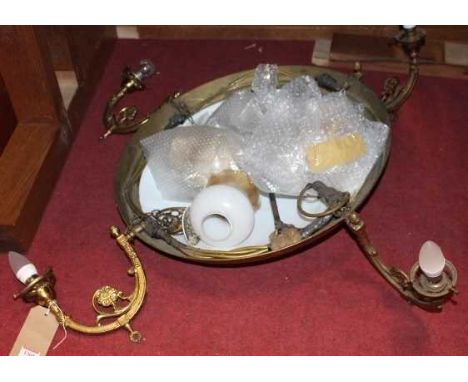 A gilt metal and milk glass inset four branch hanging ceiling light, with three replacement shades, approx dia. 100cm