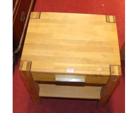 A contemporary light oak low single drawer two-tier occasional table, width 50cm