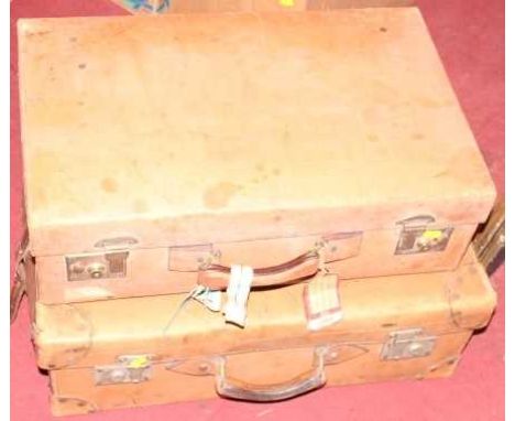 Two vintage stitched brown leather suitcases, the largest w.66cm 