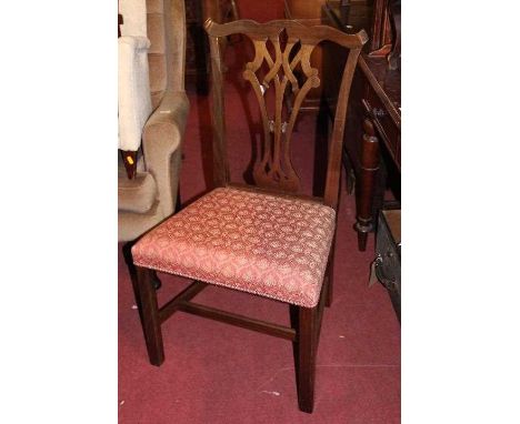 A set of ten mahogany Chippendale style dining chairs, each having floral needlework upholstered stuff over seats (8+2)Condit