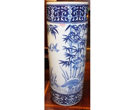 A contemporary Chinese style blue &amp; white stoneware cylindrical stick stand, height 59.5cm