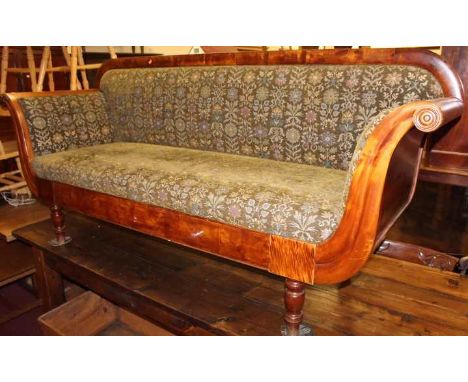 A 19th century Continental mahogany three seater scroll end sofa, all over floral upholstered, raised on turned slightly tape