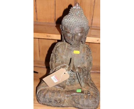 A cast metal model of a seated Buddha, h.40cm