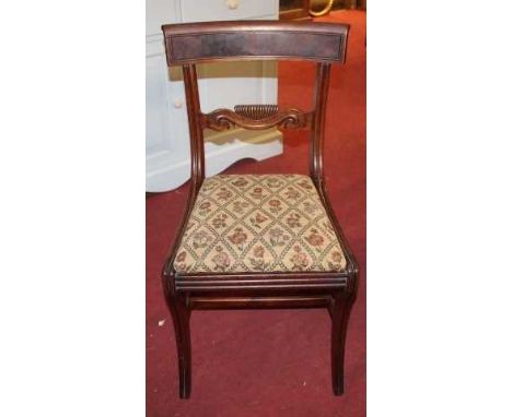 A set of five 19th century mahogany barback dining chairs, having floral tapestry upholstered drop-in pad seats (some damage)