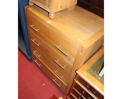 A contemporary light oak chest of four long drawers, width 80cm