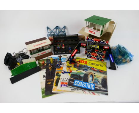 Scalextric - A boxed Control Tower # A208, a grandstand, a collection of people, a quantity of track supports, some paperwork
