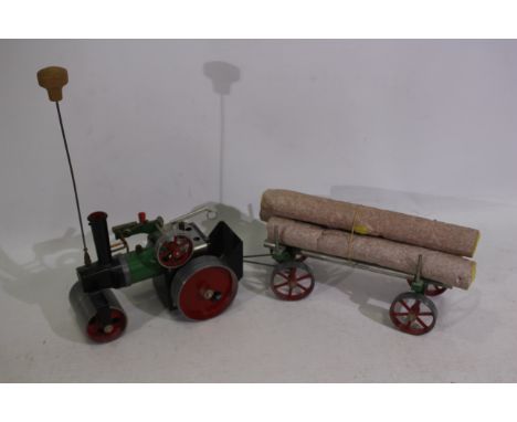 Mamod - An unboxed Mamod Steam Roller # SR1A with Lumber Wagon # LW1. They are both dusty from display and appear in Very Goo
