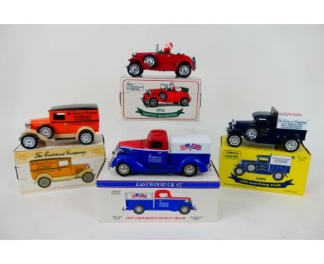 Eastwood - 4 x boxed diecast car money banks in 1:25 scale, a 1937 Chevrolet Pickup, 1931 Ford Panel Truck, 1992 Santa's Road