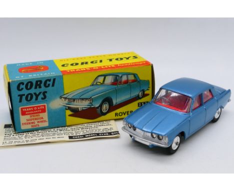 Corgi - A boxed Rover 2000 in blue # 252. The model appears in Near Mint condition with the leaflet in a Near Mint box with a