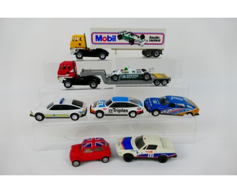 Scalextric - A collection of slot cars including 2 x Leyland Roadtrain articulated lorries, a Mini, 3 x Rover SD1 models, a S