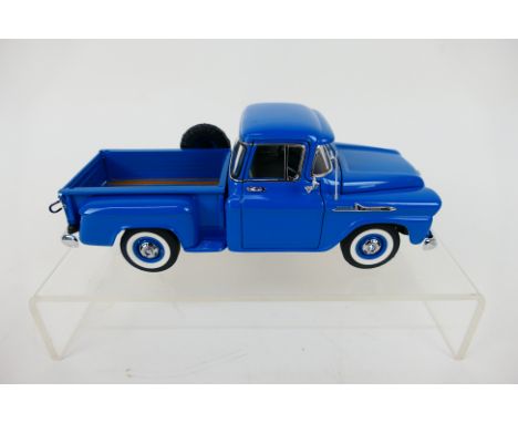 Franklin Mint - A boxed 1958 Chevrolet Apache Pickup in 1:24 scale. The model appears Mint in its original packaging. (This d