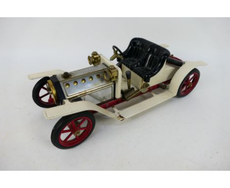 Mamod - An unboxed Mamod Steam Roadster # SR1. The model is dusty from display and shows some signs of age and use with some 