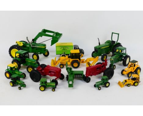 Ertl - Others - An unboxed herd of 'John Deere; related diecast, plastic and ceramic tractors in various scales  predominatel
