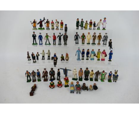 Britains - A group of 67 x figures mostly in metal and most appear to be by Britains. Includes farmer, scarecrow, engine driv