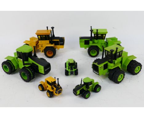 Ertl -First Edition - A collection of seven unboxed 'Steiger' articulated tractors in various scales mainly by Ertl. Lot incl