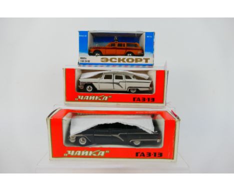 Russian Diecast - 3 x boxed models in 1:43 scale, 2 x Gaz Chaika limousines and a Gaz Volga 24 estate car in Aeroflot livery.