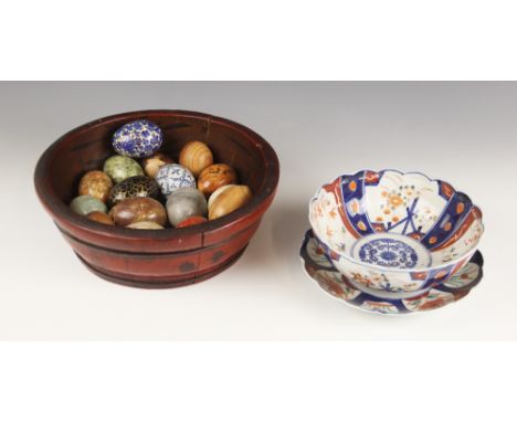 A Chinese lacquered and coopered shallow bowl, early 20th century, containing an assortment of hardstone, agate, wooden and c