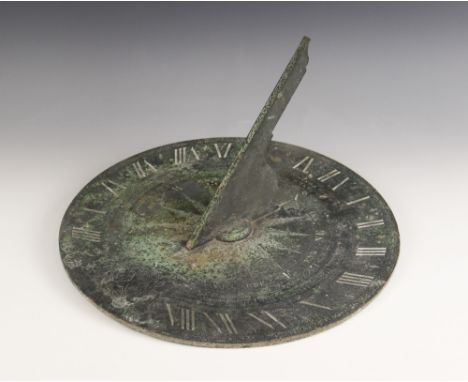 A George III bronze sundial, signed 'W & S Jones, Holborn, London' (active1795-1810), the circular plate engraved with a coat