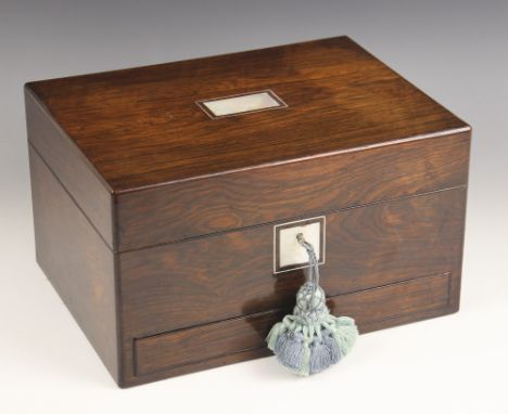 A Victorian rosewood vanity or jewellery box, of rectangular form with mother of pearl inlay, opening to reveal blue velvet l