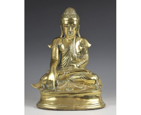 A South East Asian bronze model of buddha, 19th/20th century, seated in dhyanasana on a plinth base with hands in bhumisparsh