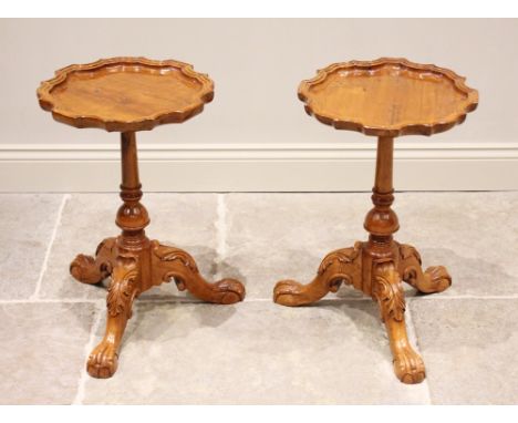 A pair of Chippendale style yew wood wine tables, late 20th century, each with a pie crust shaped top upon a ring turned and 