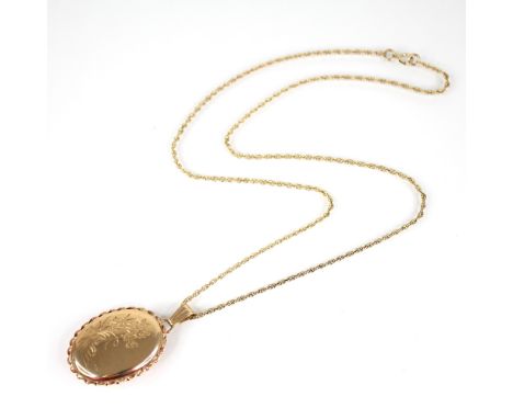 A Clogau 9ct gold locket pendant, the oval shaped locket engraved with daffodils, rope twist border, opening to reveal two tr