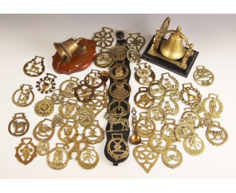 A collection of fifty horse brasses, to include a Manx triskelion example, a Warwick bear example, a "Tally Ho" hunting examp