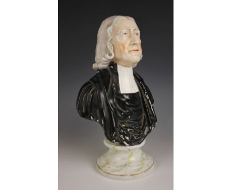 A Staffordshire portrait bust of Reverend John Wesley, mid 19th century, set to an integrated marbled effect circular plinth,