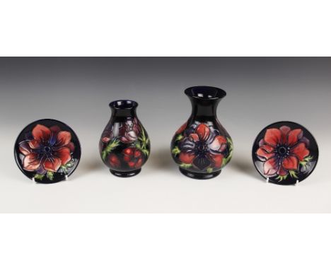 A Moorcroft baluster vase decorated in the Anemone pattern on a cobalt blue ground, impressed maker's marks for 1998, 16cm hi