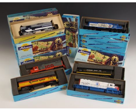 Twenty boxed Athearn HO gauge American diesel locomotives in liveries for railroad companies including Seaboard Coastline, So