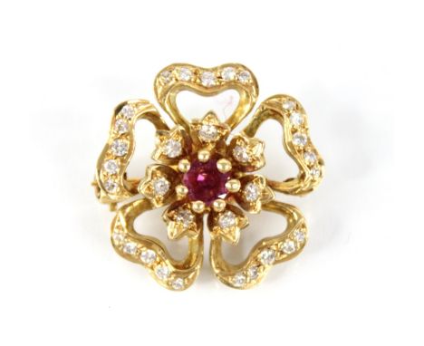 A ruby and diamond 18ct gold floral brooch by Cropp & Farr, the central round mixed cut ruby measuring 4.3mm diameter, claw s