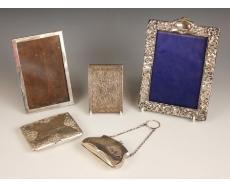 A Victorian silver mounted purse, Deakin &amp; Francis, Birmingham 1898, of rectangular form, the border embossed with scroll