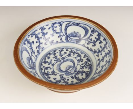 A Chinese blue and white batavia basin, 19th century, the circular shaped bowl internally decorated with lotus flowers and fo