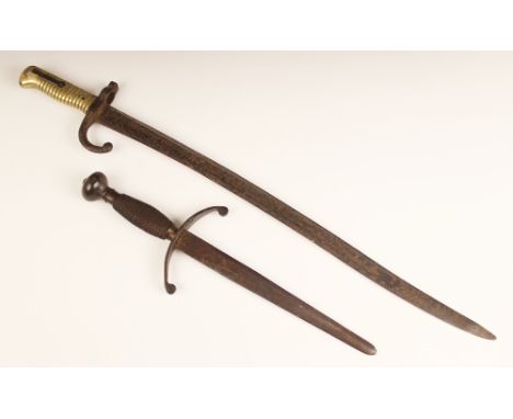 A French 1866 pattern Chassepot bayonet, the 57cm fullered yataghan blade set to a hooked quillon and ribbed brass grip, 69cm