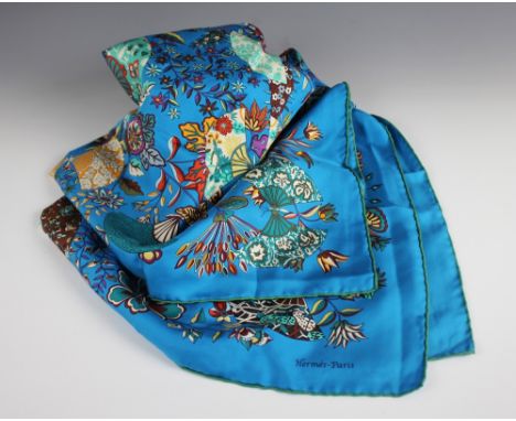 A 'Hermes' style scarf, designed with fans and spraying foliage, against a turquoise ground, with rolled edges, 88cm x 86cm 