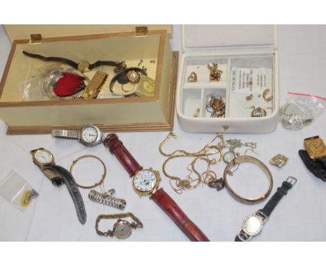 Two boxes containing a quantity of various costume jewellery including a small selection of various 9ct gold earrings, silver