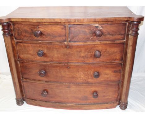 A Victorian mahogany bow front chest of two short and three long drawers flanked by pillar columns, 41" high x 51" wide (af)