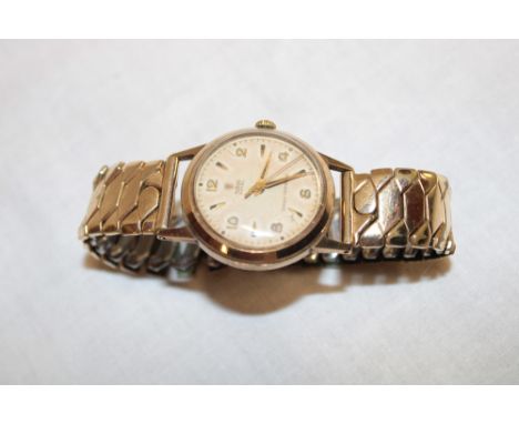 A Rolex Tudor Royal 9ct gold wristwatch, the inner case marked "12324 Dennison made for Rolex A.L.D. 631413" with engraved pr