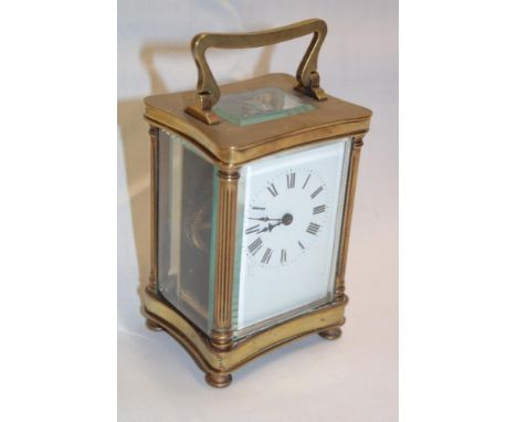 A French carriage clock in brass traditional case and part leather carrying case (af)