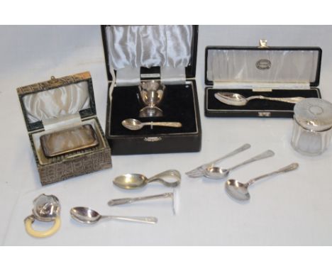 A gent's small silver mounted travelling clothes brush and comb, Birmingham marks in fitted case together with a sterling sil