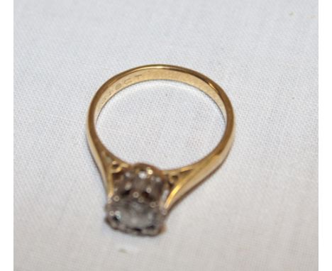 An 18ct gold engagement ring set a diamond solitaire (3.8g)