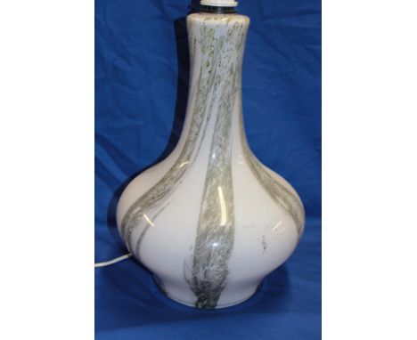 A retro glass table lamp with grey and green lined decoration