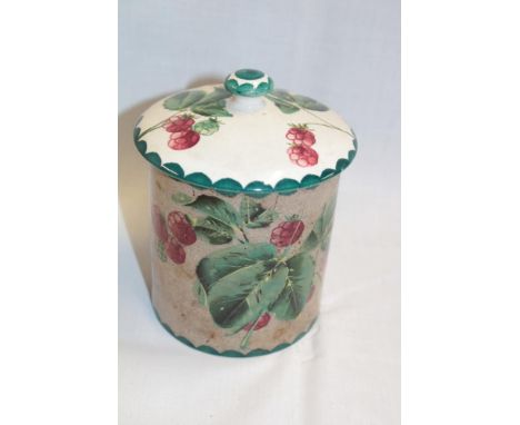 A Wemyss pottery cylindrical jar and cover with raspberry and leaf decoration, 5½" high (af)