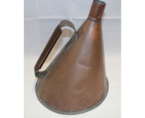 A 19th century copper conical-shaped flask with loop handle, 12½" high
