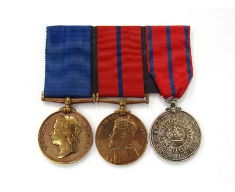 A Metropolitan Police Jubilee and Coronation medal group of three consisting of Victoria 1897 Jubilee, Edward VII 1902 Corona