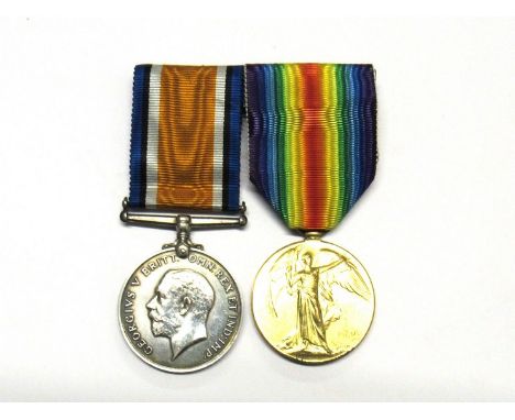 A WWI pair of medals awarded to 26072 PTE. G.E. MILLS NORF. R. together with copied documentation.